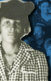 A photo of Recy Taylor, a Black woman, with Black women behind her.