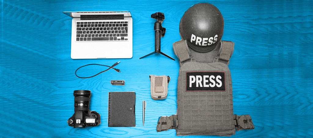 A collage of a camera, bulletproof vest and hat that say "press" on it, a journal, recording equipment and a laptop.